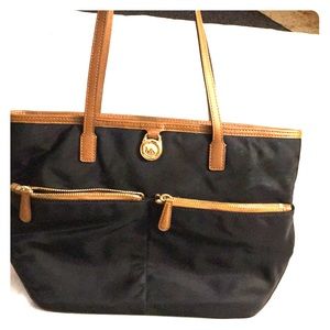 A brand new Michael Kor pocketbook